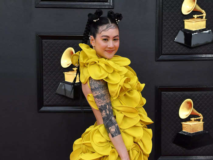 Michelle Zauner of Japanese Breakfast wore a yellow minidress with the back cut out.