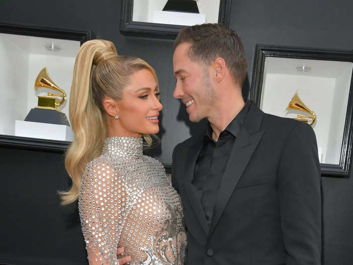 Newlyweds Paris Hilton and Carter Reum arrived on the Grammys red carpet in style.