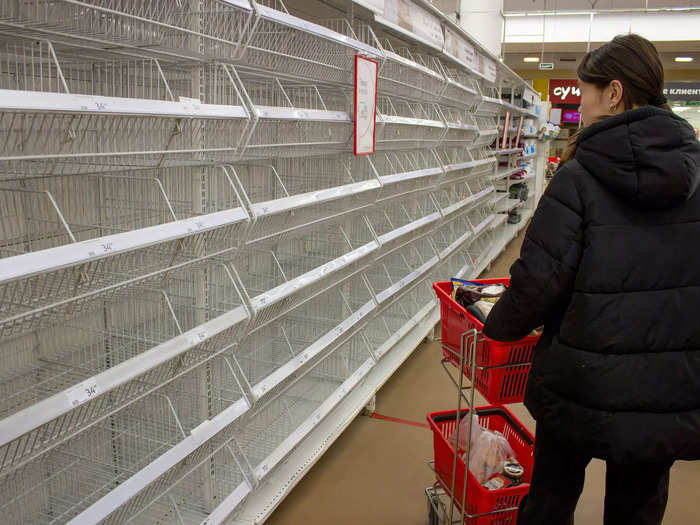 In grocery stores, images of empty shelves emerged as financial sanctions designed to cut Russia off from the global financial system stunted trade and a number of shipping companies withdrew.