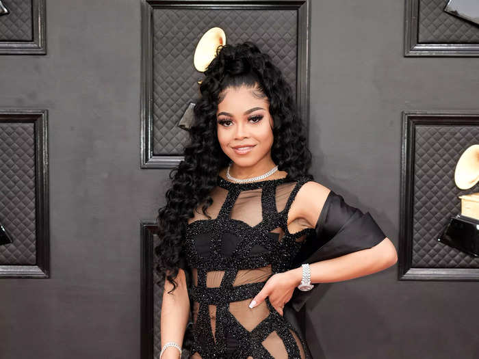 Destiny Jones, the daughter of Grammy award-winning rapper Nas, arrived in a black dress with sheer cutouts.