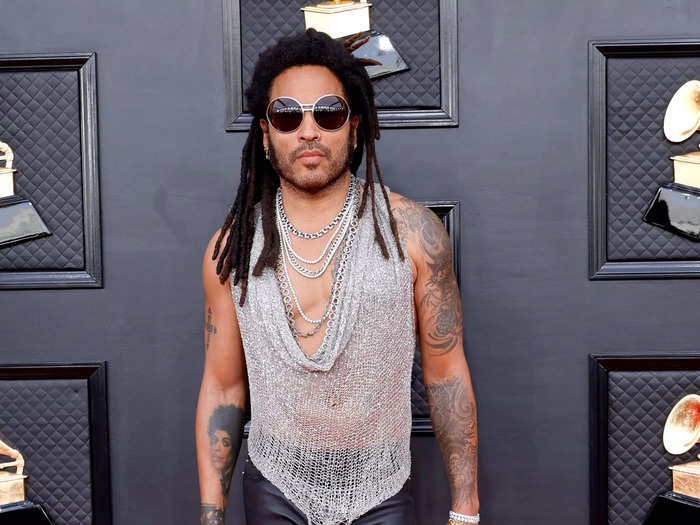 Lenny Kravitz paired a sheer metallic chain-mail top by Natalia Fedner with a pair of YSL leather pants and knee-high boots.