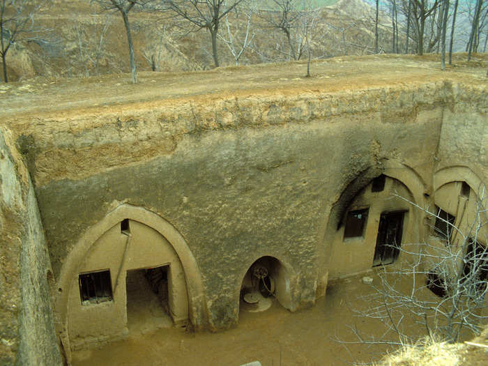 In some parts of northern China, large pits are dug into the ground to form sunken courtyard homes.