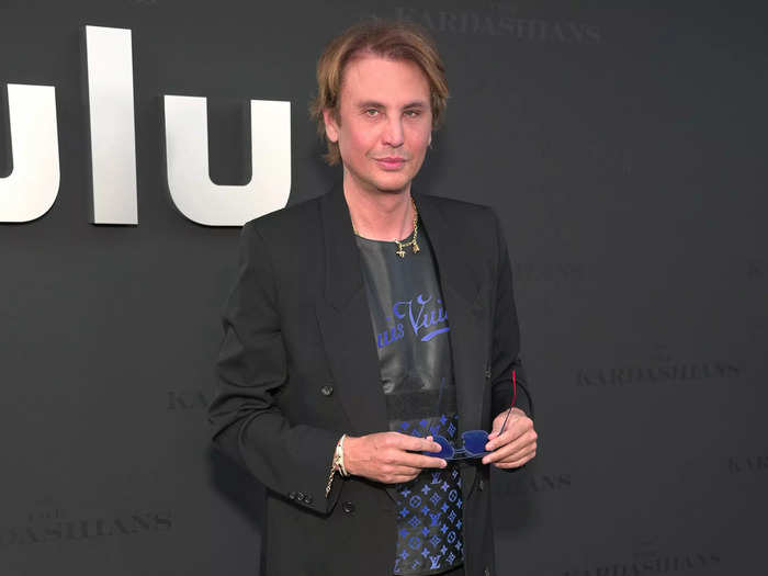 Jonathan Cheban, aka "Food God," wore a Louis Vuitton shirt under an all-black outfit.