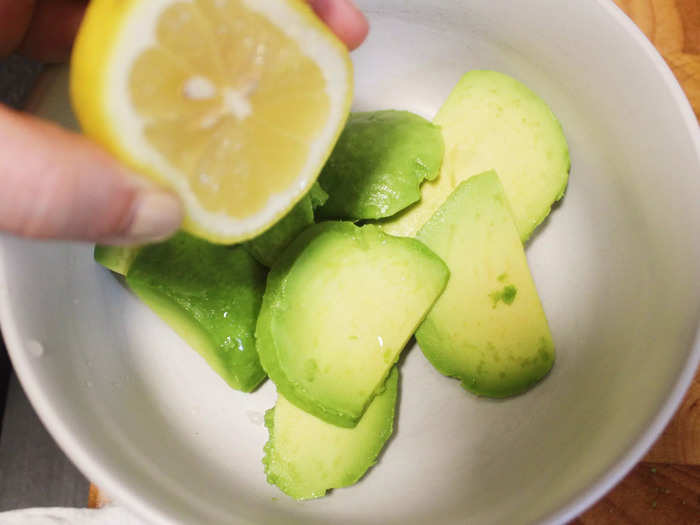 I then peeled and sliced the avocado before adding it to a small bowl.