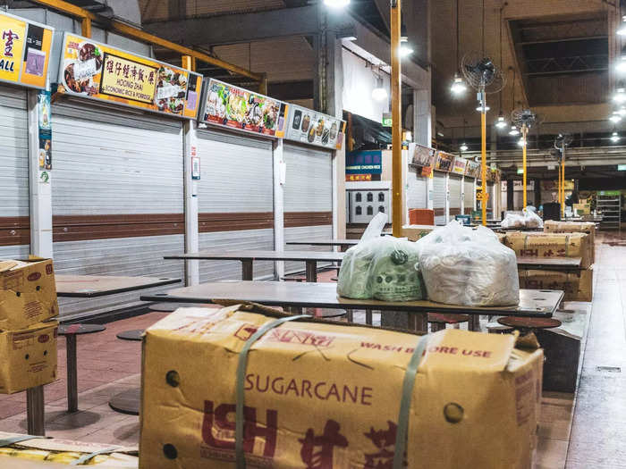 In one area of the hawker center, a few vendors dropped off supplies for the day.