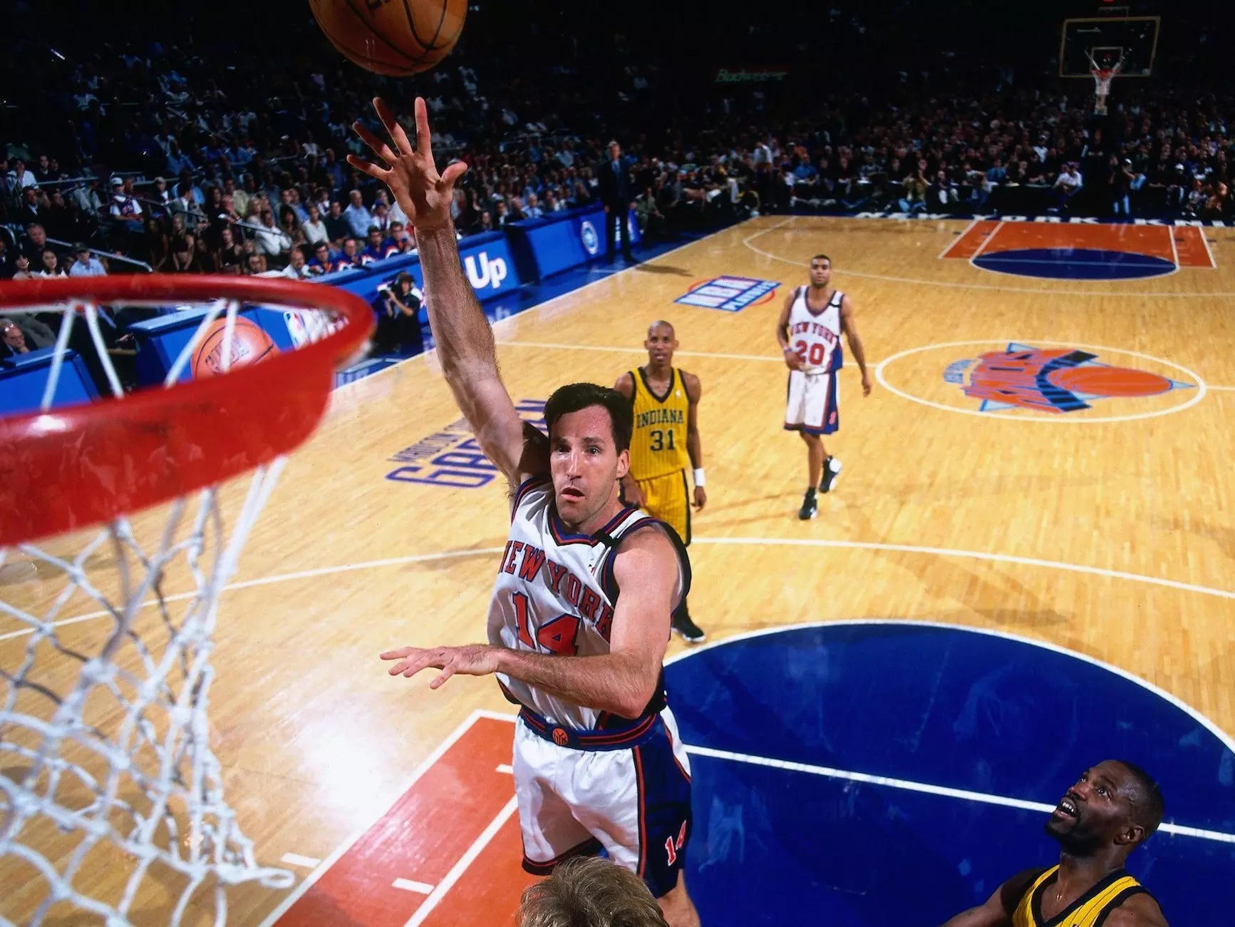 Chris Dudley shoots a shot over a defender during the 1999 NBA playoffs.