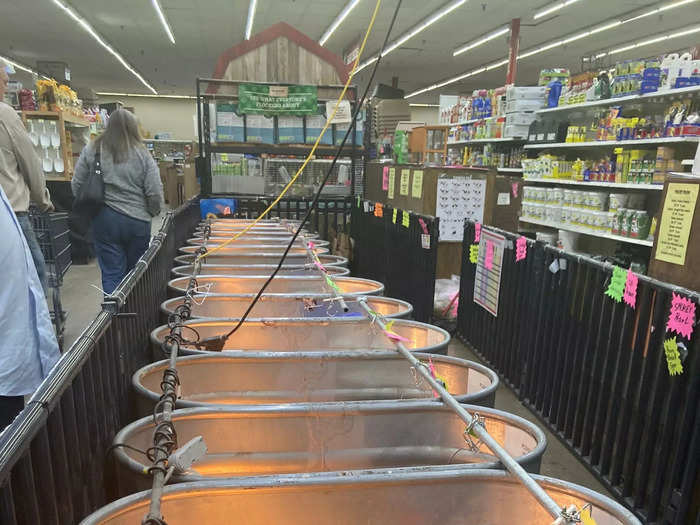 An entire row of tubs containing hordes of cheeping baby chicks — and occasionally ducklings — sits at the core of the store.