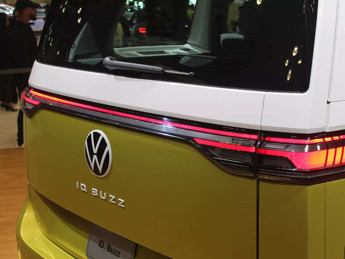 Modern touches include a horizontal light bar that spans the rear of the van.