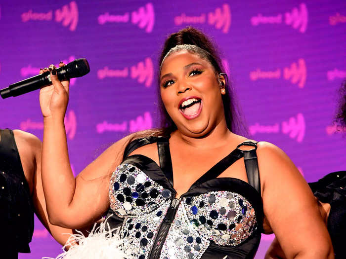 While performing at 30th Annual GLAAD Media Awards, Lizzo wore a sparkly leotard with feathers.