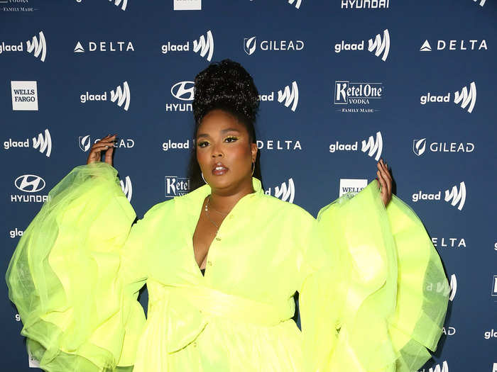 The singer enjoyed another monochrome moment in a neon-yellow shirtdress with statement sleeves at the 2019 Annual GLAAD Media Awards.