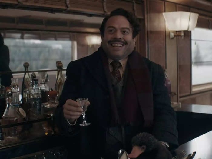 Jacob drinks Gigglewater, a beverage he had in the first "Fantastic Beasts" film, on the train.