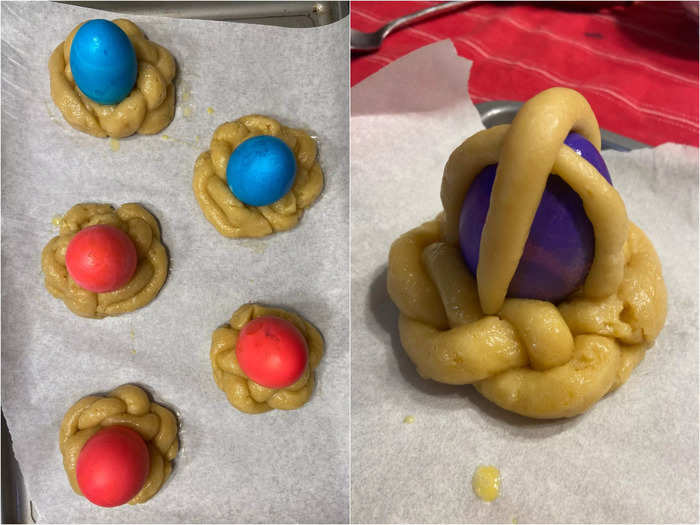 I placed each of the eggs upright in the center of the dough and created crosses on some of them.