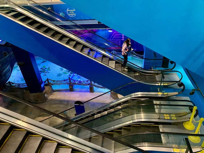 Visitors have to buy tickets to enter the aquarium, so I peaked down into the expansive space below the main shopping areas.