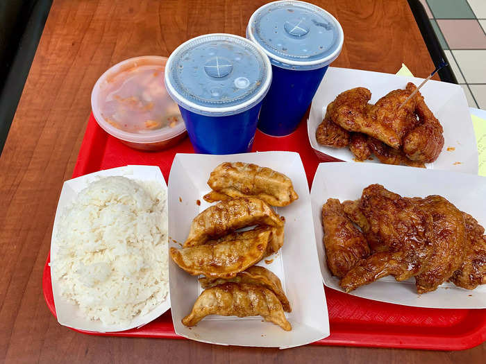 Each order of wings came with a side and a drink, so I opted for white rice and kimchi, plus an order of pork pot stickers.