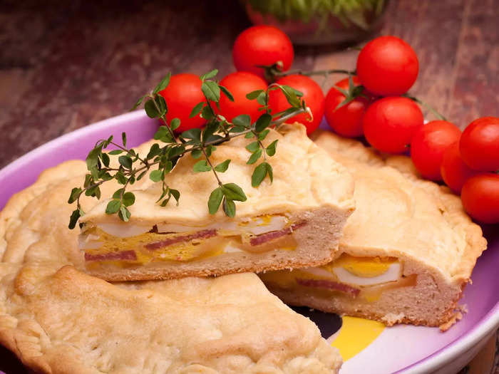 People in the Naples region of Italy eat a cross between pizza and pie at Easter.