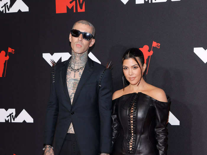 Kardashian wore an edgy and risqué minidress on the 2021 VMAs red carpet alongside Travis Barker.