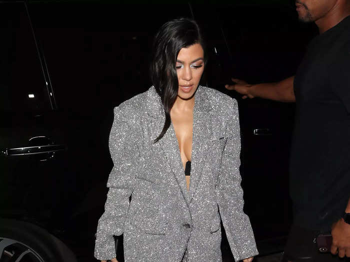 Kardashian wore a signature boxy suit with an exposed bra to Diana Ross