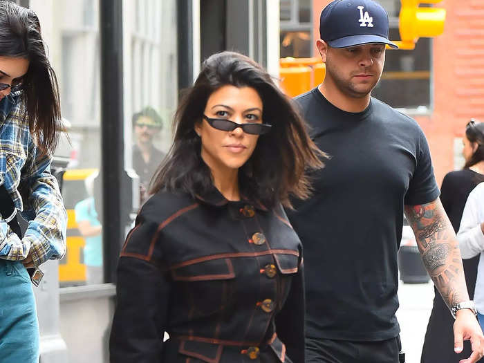 Kardashian dressed up biker shorts in 2018 with surprisingly complementary pieces.