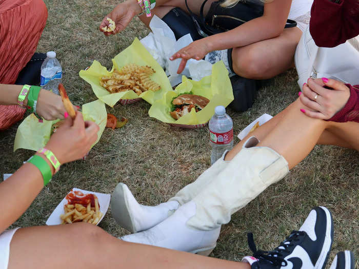 There are very few tables or seating areas, so people typically end up eating on the ground.