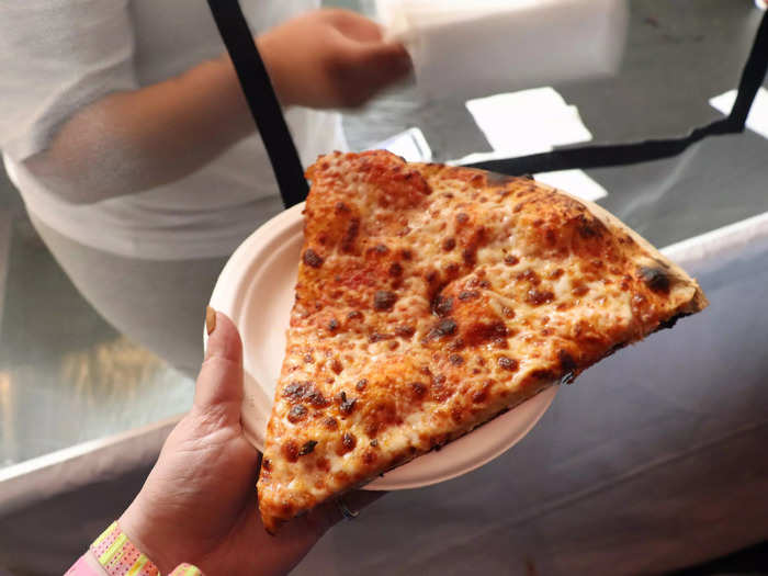 This slice of cheese pizza cost $11.