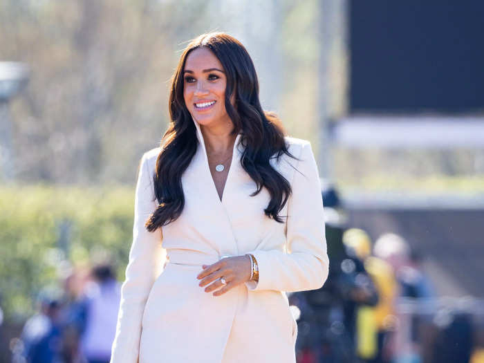 Returning to jeans, Markle wore heels and a cream blazer on day two of the games on Sunday.