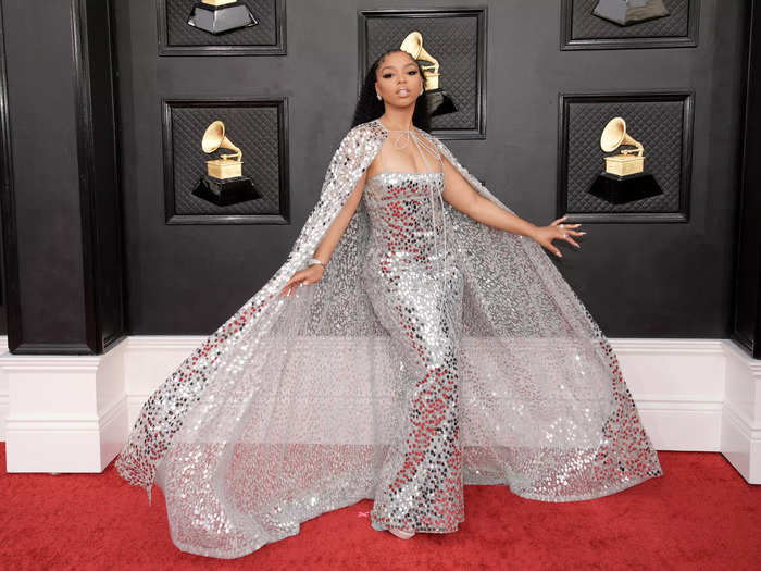 Chloe Bailey sparkled like a disco ball at the Grammys in this silver dress and reflective cape.