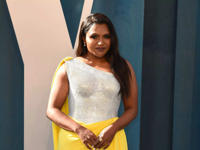 Mindy Kaling also attended the Vanity Fair Oscar Party. She wore a dress with a sculpted silver top and canary-yellow cape and skirt.