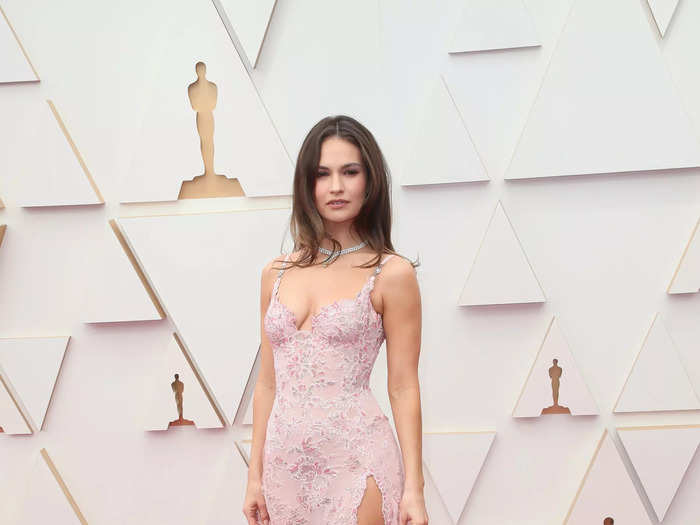 Lily James attended the Academy Awards on March 27 in this pastel-pink gown with a thigh-high slit.