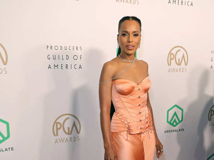 On March 19, Kerry Washington attended the Producers Guild Awards in a silk coral dress with a corset bodice.