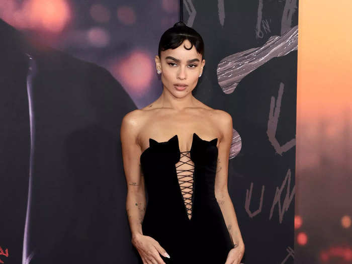 Zoë Kravitz showed off her full commitment to playing Catwoman at the premiere of "The Batman" on March 1 by rocking this strapless black dress with cat heads.