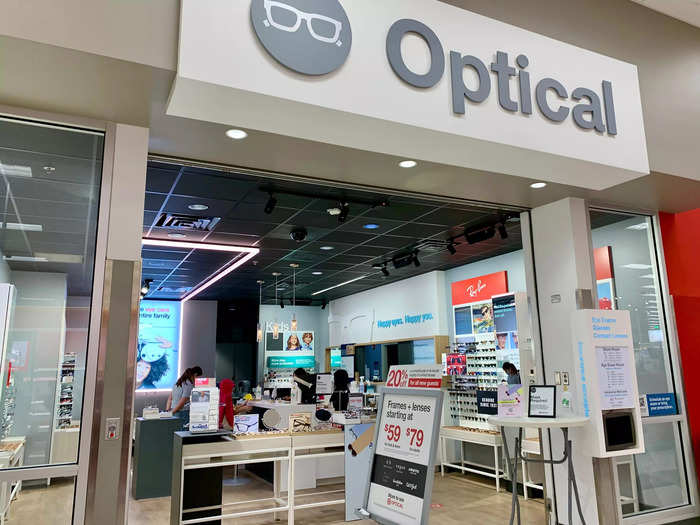 An optician office was located near the front of the store next to CVS, with advertisements displaying deals on glasses and contacts.