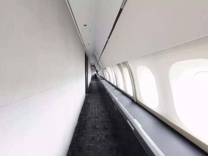 Connecting the rooms is a long passageway that features the same flooring that Ruiz used on prior refurbishments, creating consistency across his collection of private jets.