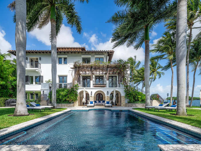 The outdoor pebble stone pool is heated and is located right next to the bay.