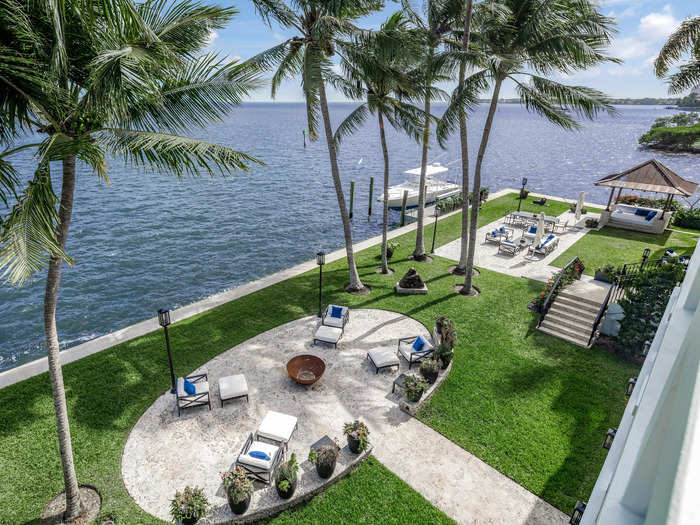 The mansion has direct ocean access, with a private dock and a 180-degree view of Sailboat Bay.