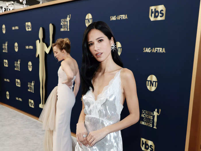 Looking ready for a decadent bachelorette party, Kelsey Asbille Chow wore metallic fabric with a lace trim.