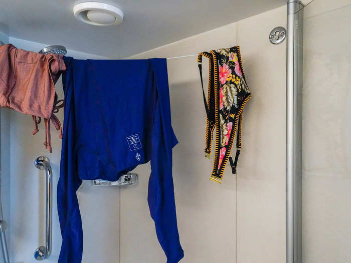 At the top of the shower, a pull-out clothing line was useful for drying my bathing suits.