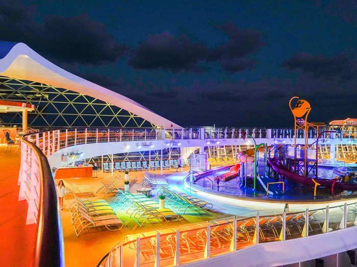 During my nighttime walks across the 1,188-foot-long ship on a recent cruise, I noticed that it was equipped with a variety of lighting that would transform it into a colorful oasis at night.