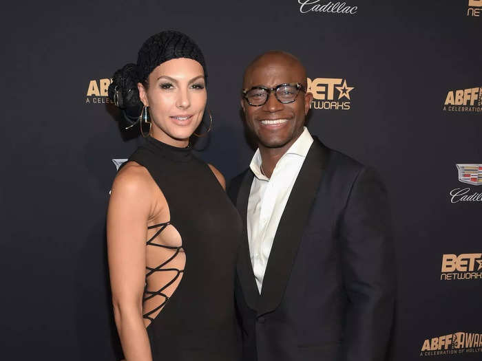 In February 2016, Amanza Smith walked a red carpet with her then-boyfriend Taye Diggs. She wore a bold black dress that had a mock-neck bodice and crisscross strings holding it together on each side.