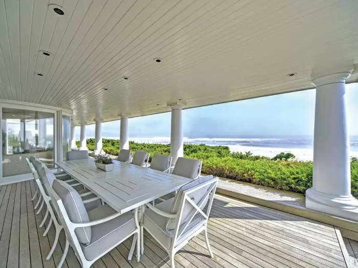 The sheltered outdoor patio offers residents a view of the Atlantic Ocean.