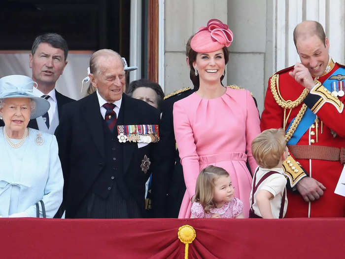 William and Prince George shared a cute father-son moment at Trooping the Colour in 2017 while Middleton laughed beside them.