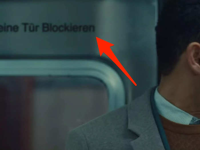 As Alan travels to the past, the doors behind him have German signage, a clue to where he