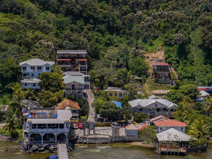 As we started to sail away, I saw houses and streets at the foothills of the mountainous jungle and wondered about the lives of the people inside them.