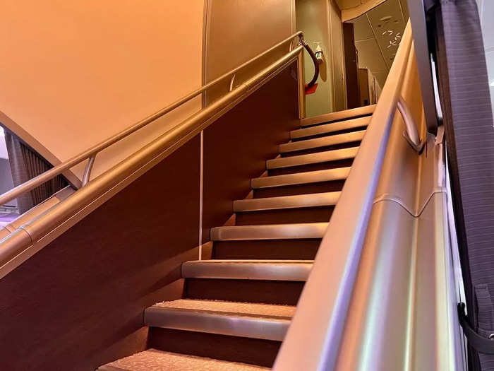 The six-suite first class cabin is located toward the front of the plane on the second level of the A380, which is reached via a grand staircase.