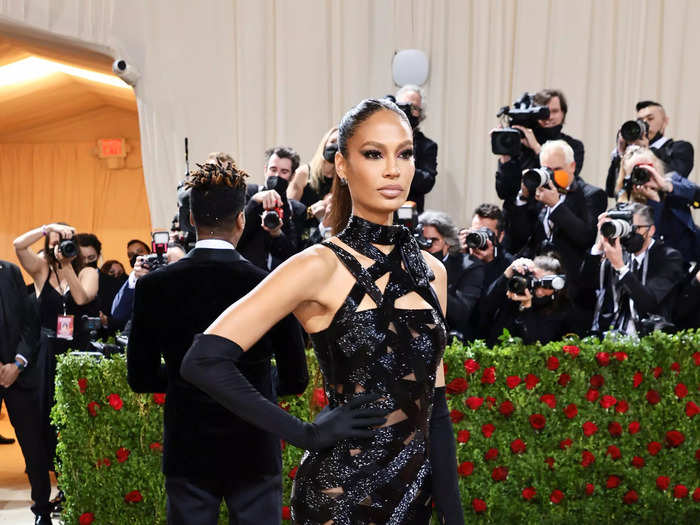 Model Joan Smalls stunned in a strappy black dress.