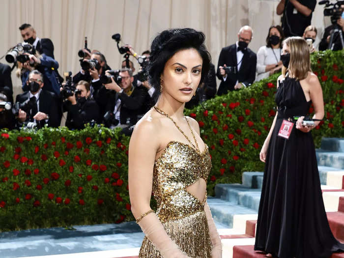 Camila Mendes dazzled in a glittering, gold gown.