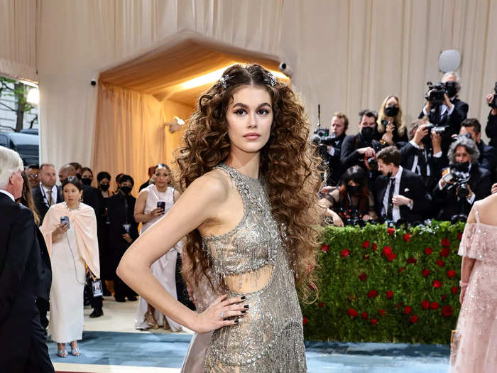 Kaia Gerber stunned in metallic dress covered in beaded fringe.