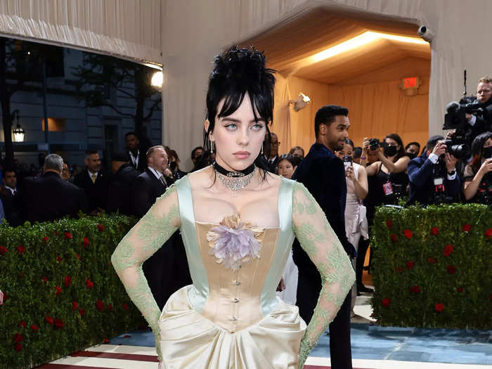 Billie Eilish paired her pastel gown with jet-black hair for the red carpet.