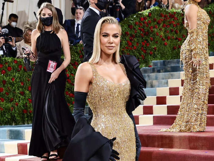 Khloe Kardashian shimmered in gold from head to toe.