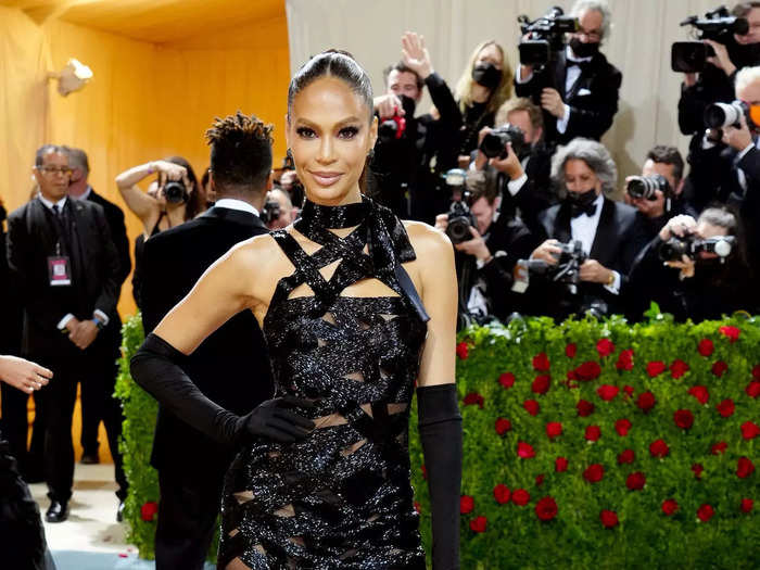 Model Joan Smalls stunned in a strappy black dress.