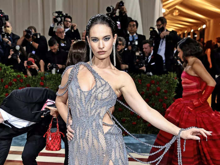 Lily James wore a sparkling periwinkle gown with plenty of cutouts.